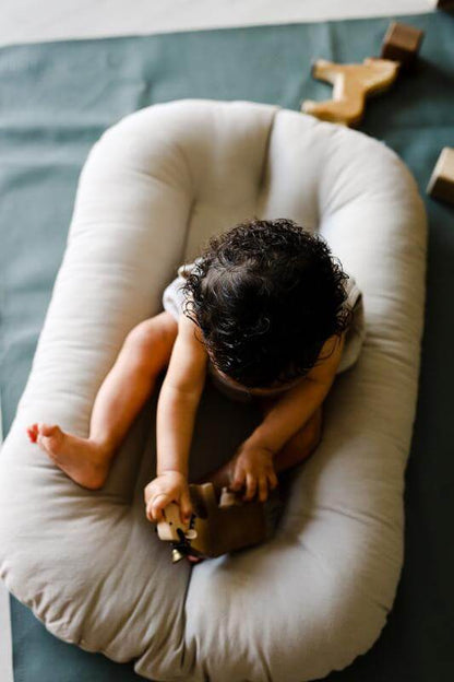 כרית קן לתינוקות - SnugglePod™